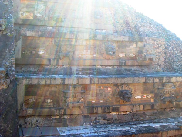 Sunshines over ancient pyramid symbols at Mexico Teotihuacan Ancient Illumination copyright